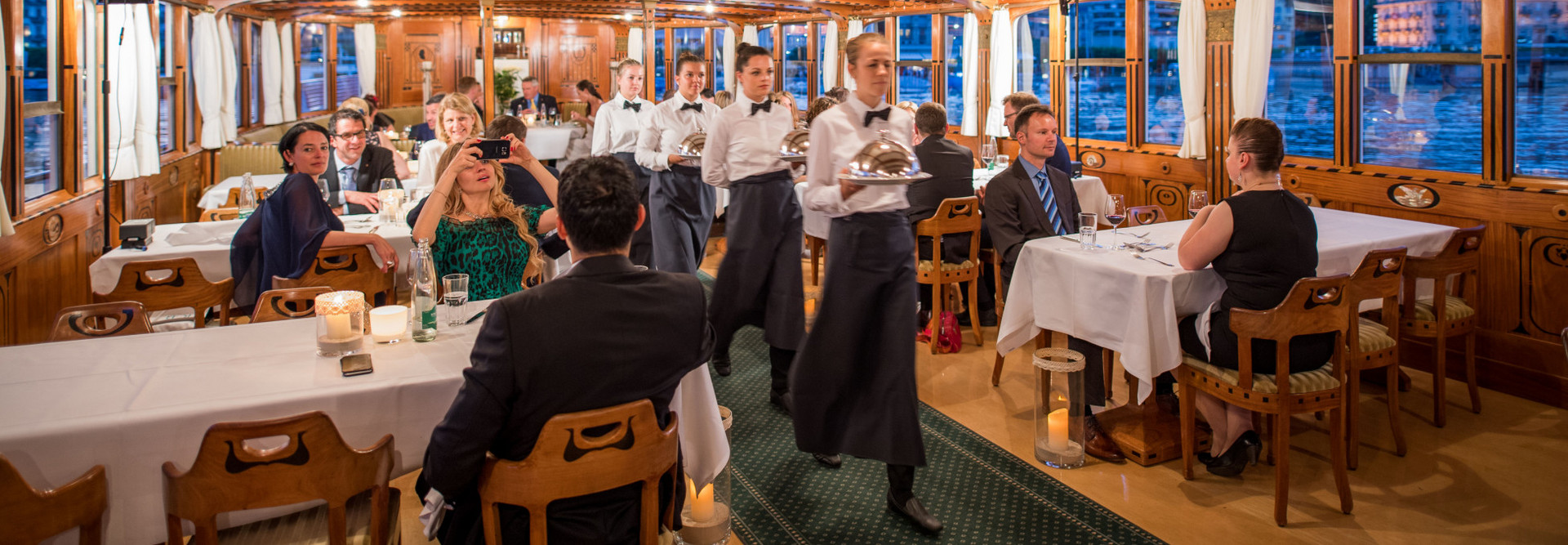 The gala dinner is served on a steamer of the Lake Lucerne Navigation Company