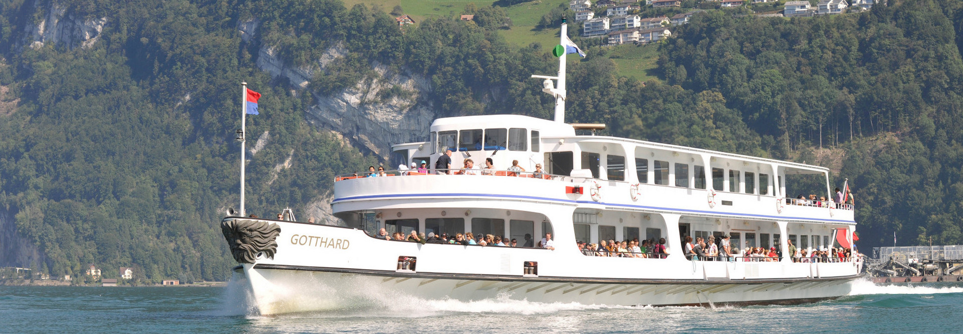 The motor vessel Gotthard sails on Lake Lucerne on a beautiful summer day.